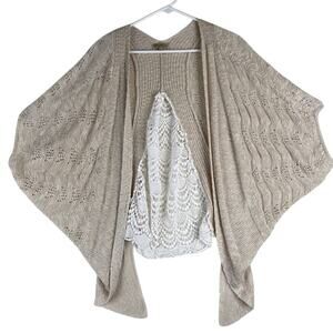 Democracy women's cream cardigan with a lace insert in back.